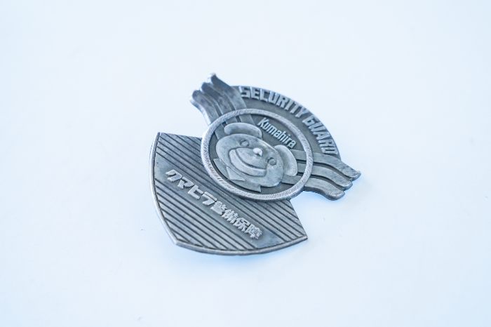 クマヒラ警備保障時代の社章